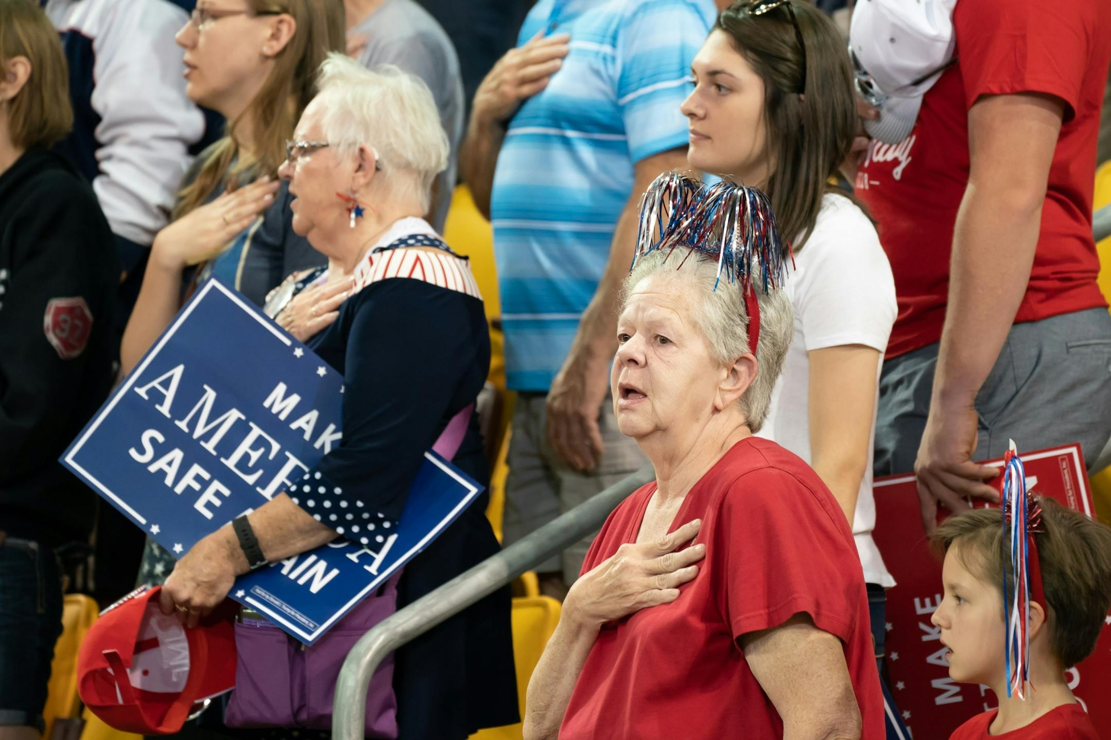 Singing the Star Spangled Banner at the beginning of the rally.