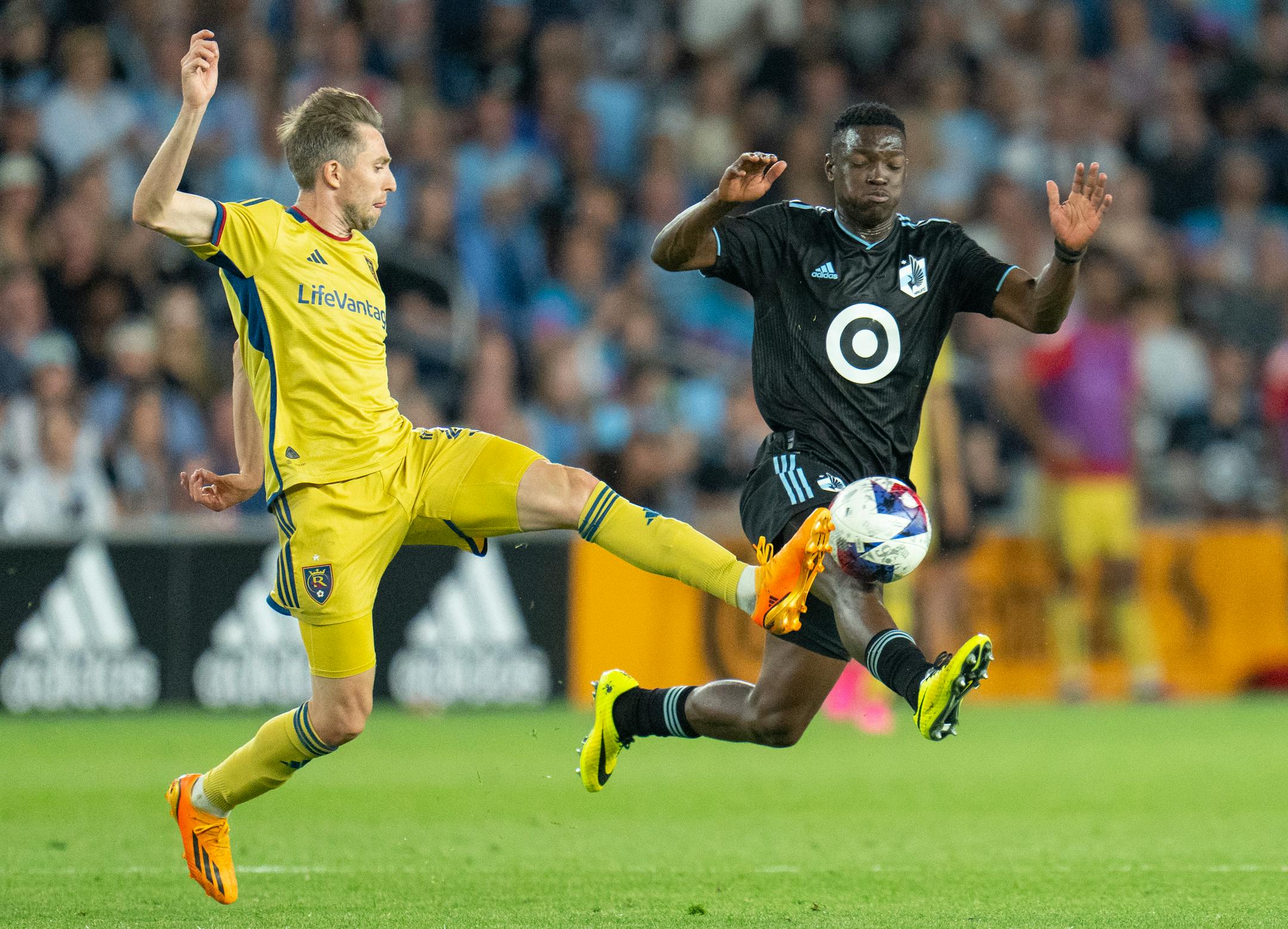 Real Salt Lake defender Andrew Brody (2) kicks a loose ball away from Minnesota United forward Bongokuhle Hlongwane (21) in the second half.