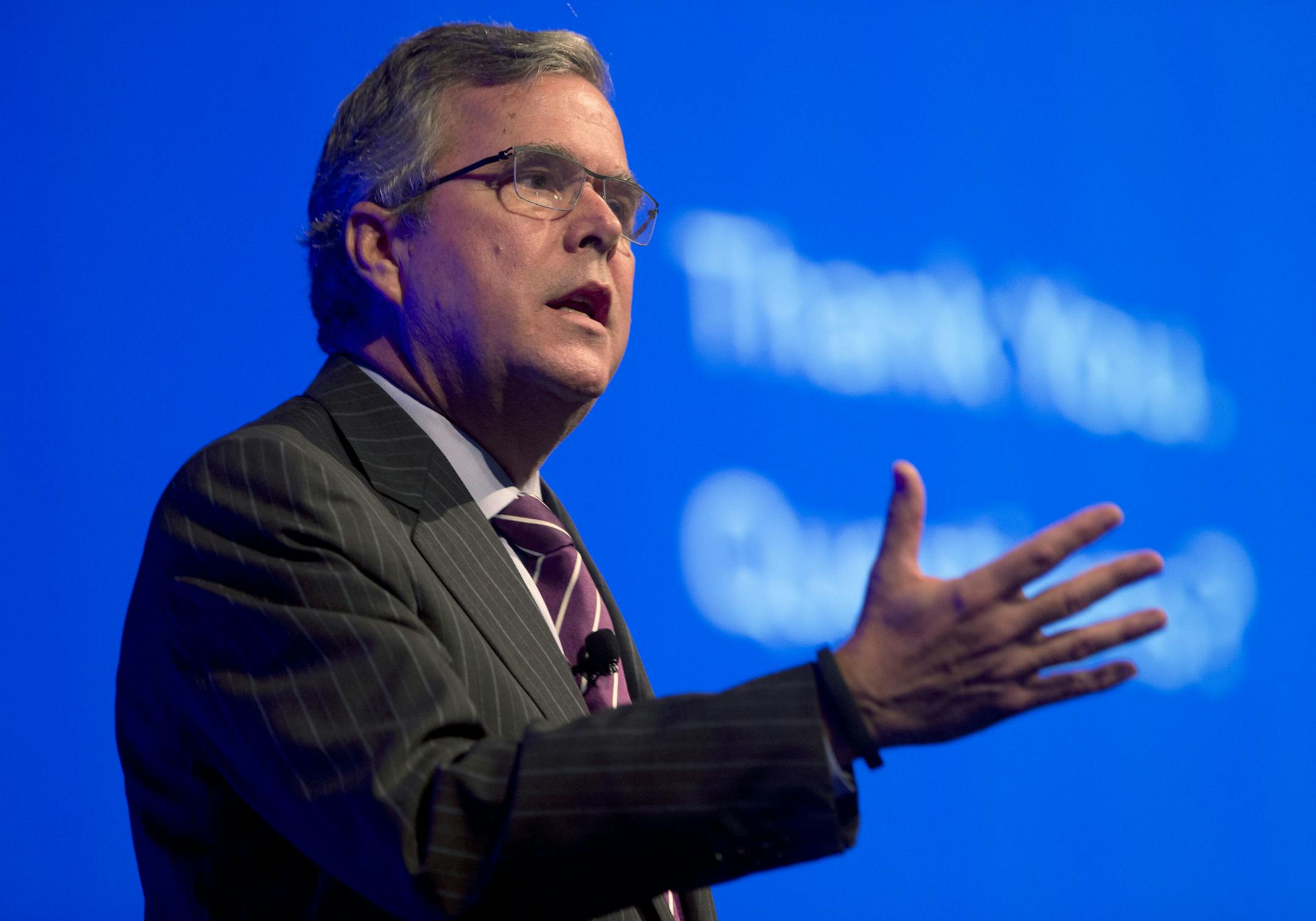FILE - This Jan. 29, 2014 file photo shows former Florida Gov. Jeb Bush speaking in Hollywood, Fla. Will Jeb Bush run for president? The former Florida governor says he’s undecided but his decision is one of the most significant unknowns looming over the 2016 Republican presidential contest. A White House bid by the scion of the Bush political dynasty would shake up a wide-open field and set up a showdown with the tea party movement. (AP Photo/Wilfredo Lee, File)