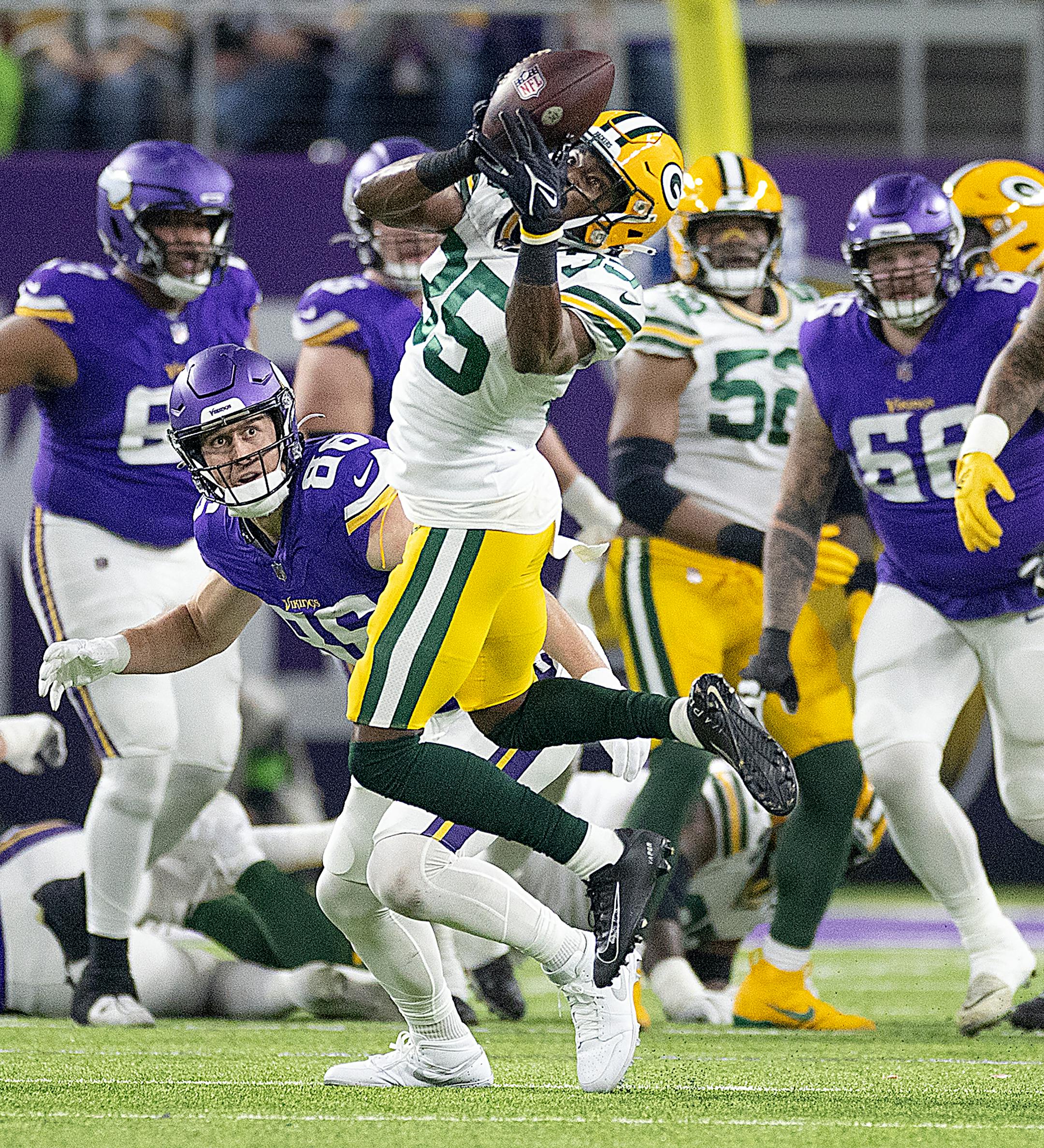 Packers cornerback Corey Ballentine (35) intercepts the ball in the first quarter at U.S. Bank Stadium, in Minneapolis, Minn., on Sunday, Dec. 31, 2023. ] Elizabeth Flores • liz.flores@startribune.com