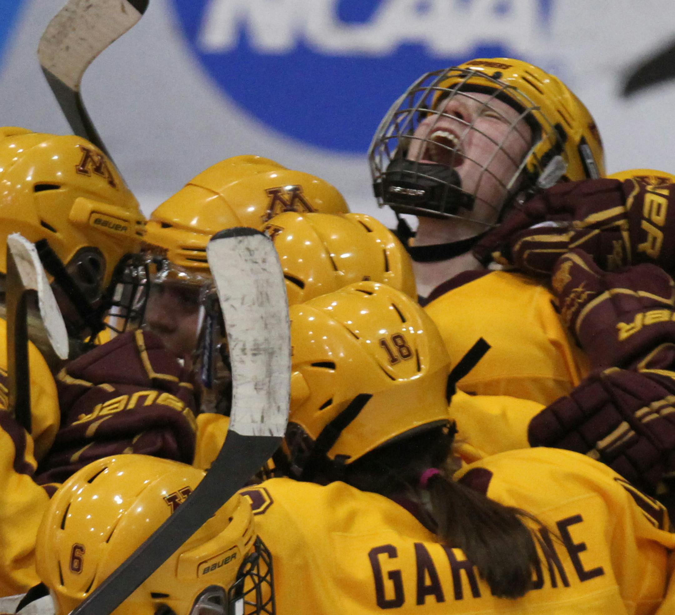 Gopher vs. North Dakota, Ridder Arena, 3/16/13. (left to right) The Gophers celebrate their win.] Bruce Bisping/Star Tribune bbisping@startribune.com