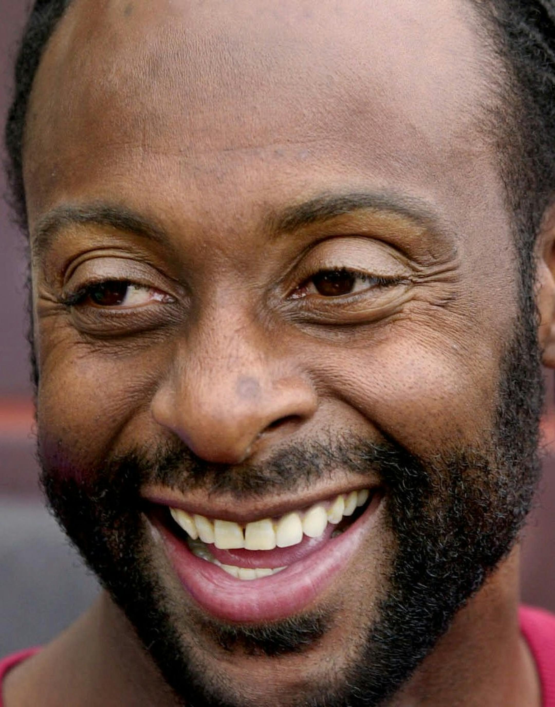 San Francisco 49ers wide receiver Jerry Rice smiles during a news conference at 49ers headquarters in Santa Clara, Calif., Wednesday, Dec. 13, 2000, as he talks about possibly playing his last home game at 3Com Park as a 49er this Sunday. (AP Photo/Paul Sakuma)