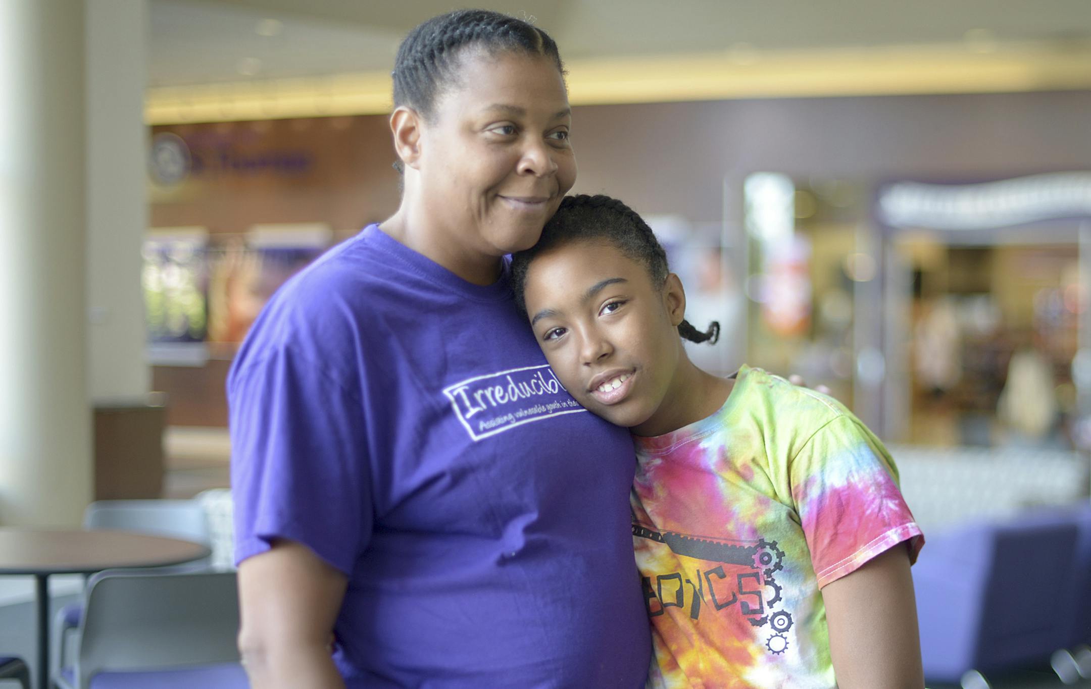 Darlene Fry, executive director of the Irreducible Grace Foundation, and her adopted daughter, Grace, 12. The foundation – named after Grace – helps give vulnerable youth, especially those who have aged out of foster care, a voice and helps them transition into adulthood. (Photo courtesy of Mark Vancleave)