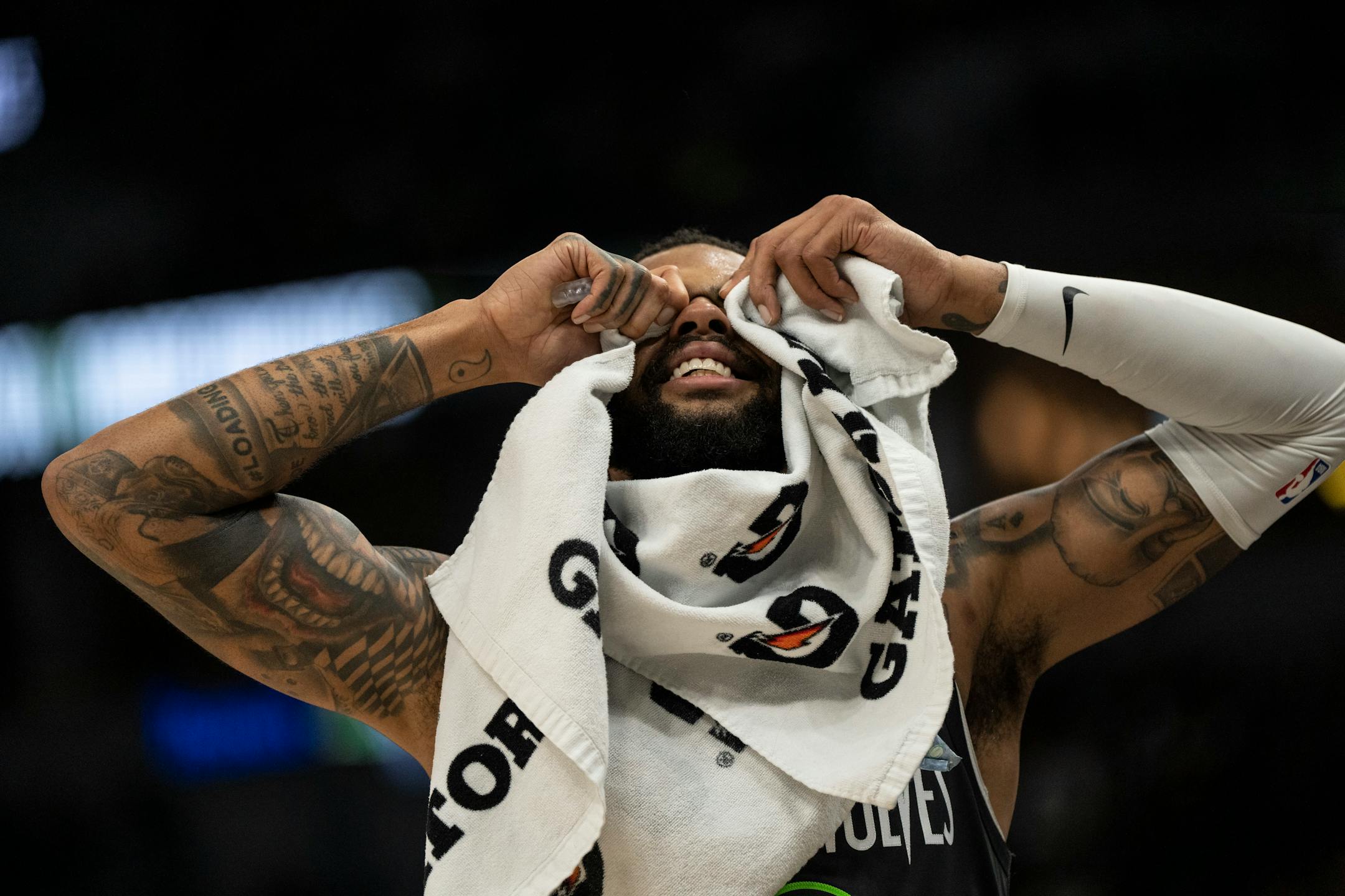 Minnesota Timberwolves guard D'Angelo Russell (0) reacts to a foul on teammate Minnesota Timberwolves guard Bryn Forbes (10) in the second quarter.