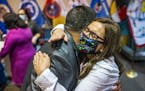 Lt. Gov. Peggy Flanagan embraced Jamie Edwards of the Mille Lacs Band of Ojibwe last week in St. Paul after Gov. Tim Walz signed a law reinforcing the