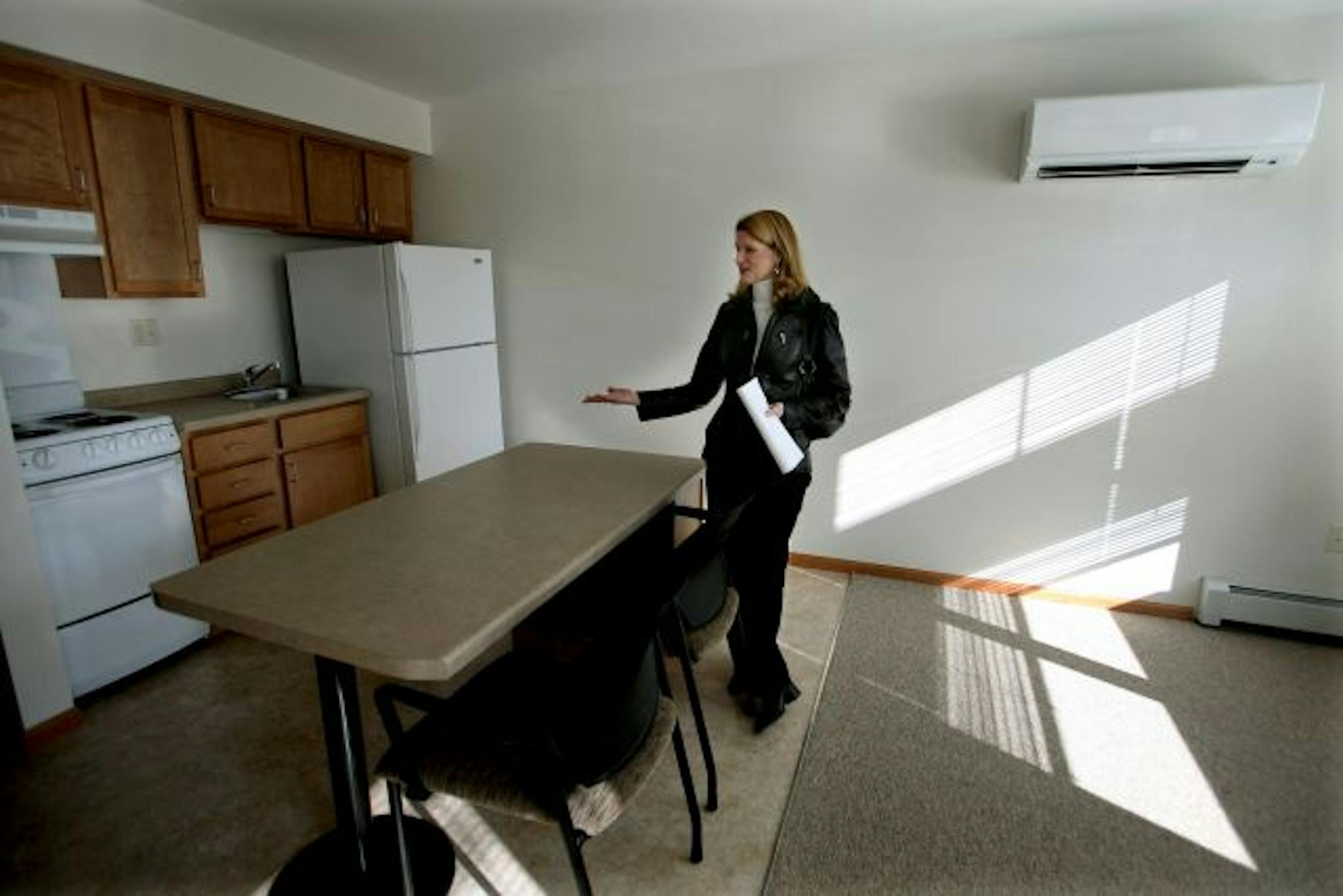 Kari Gill, the executive director of the Dakota County Development Agency, gave a tour of Lincoln Place, which has 24 efficiency apartments. The setup is designed to help people who have aged out of foster care or who struggle with homelessness.