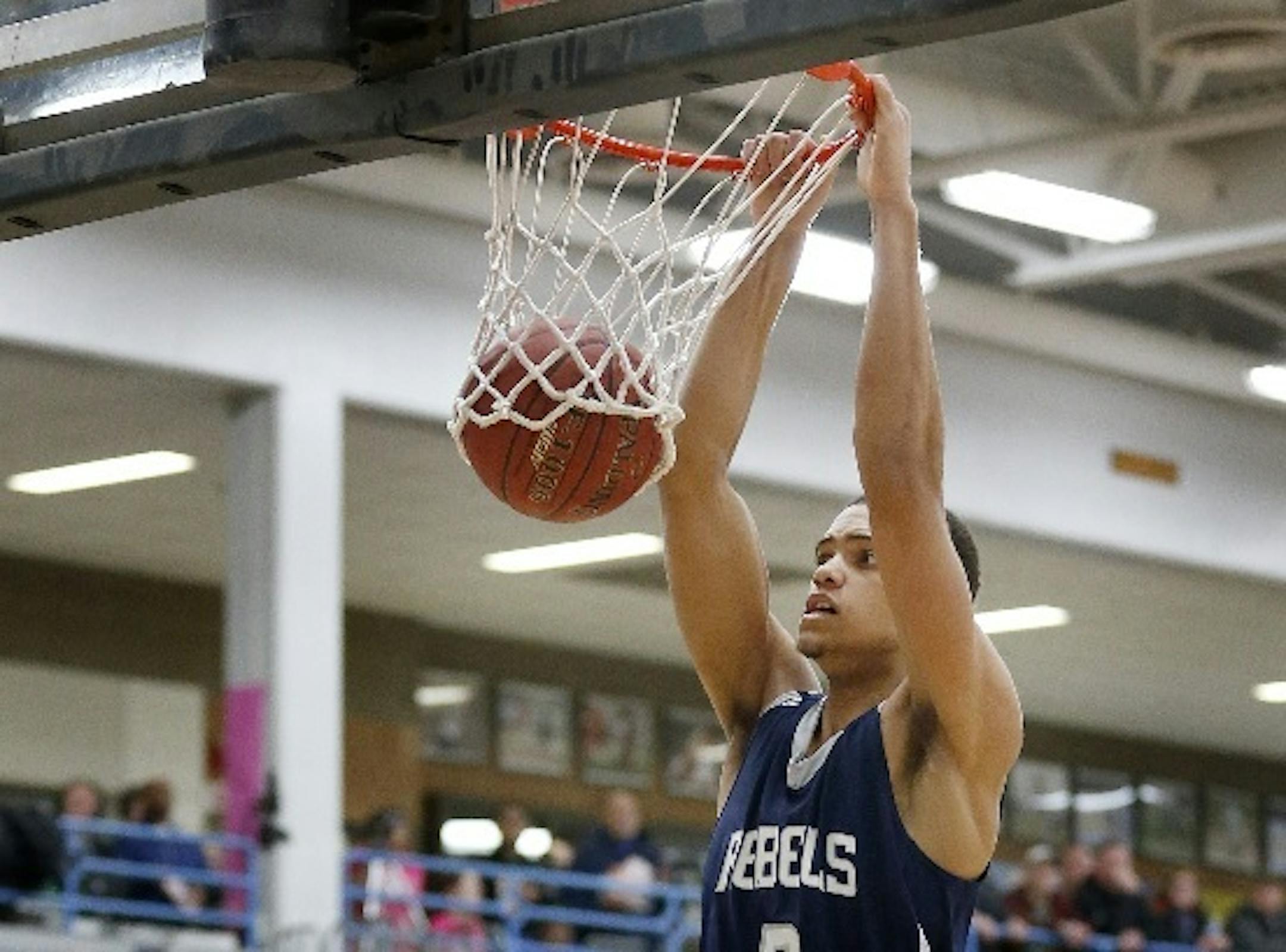 Champlin Park senior center Theo John will announce his college decision with teammate McKinley Wright on Tuesday night at 5 p.m. at their high school.
