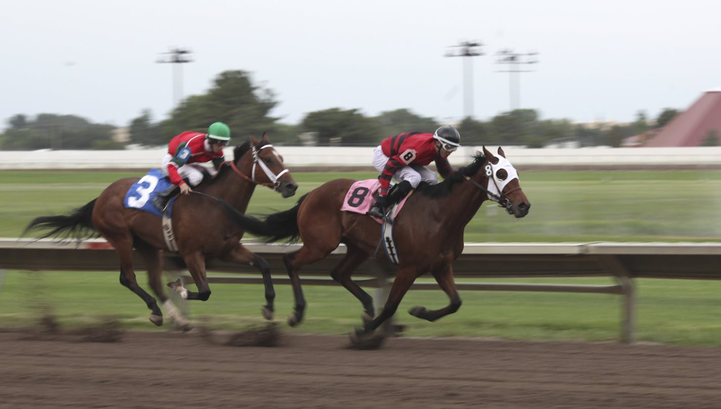 Doug Oliver on Eurasian took the lead in the third race to win on the first day at Canterbury Park in Shakopee, Minn., Friday, May 18, 2012.