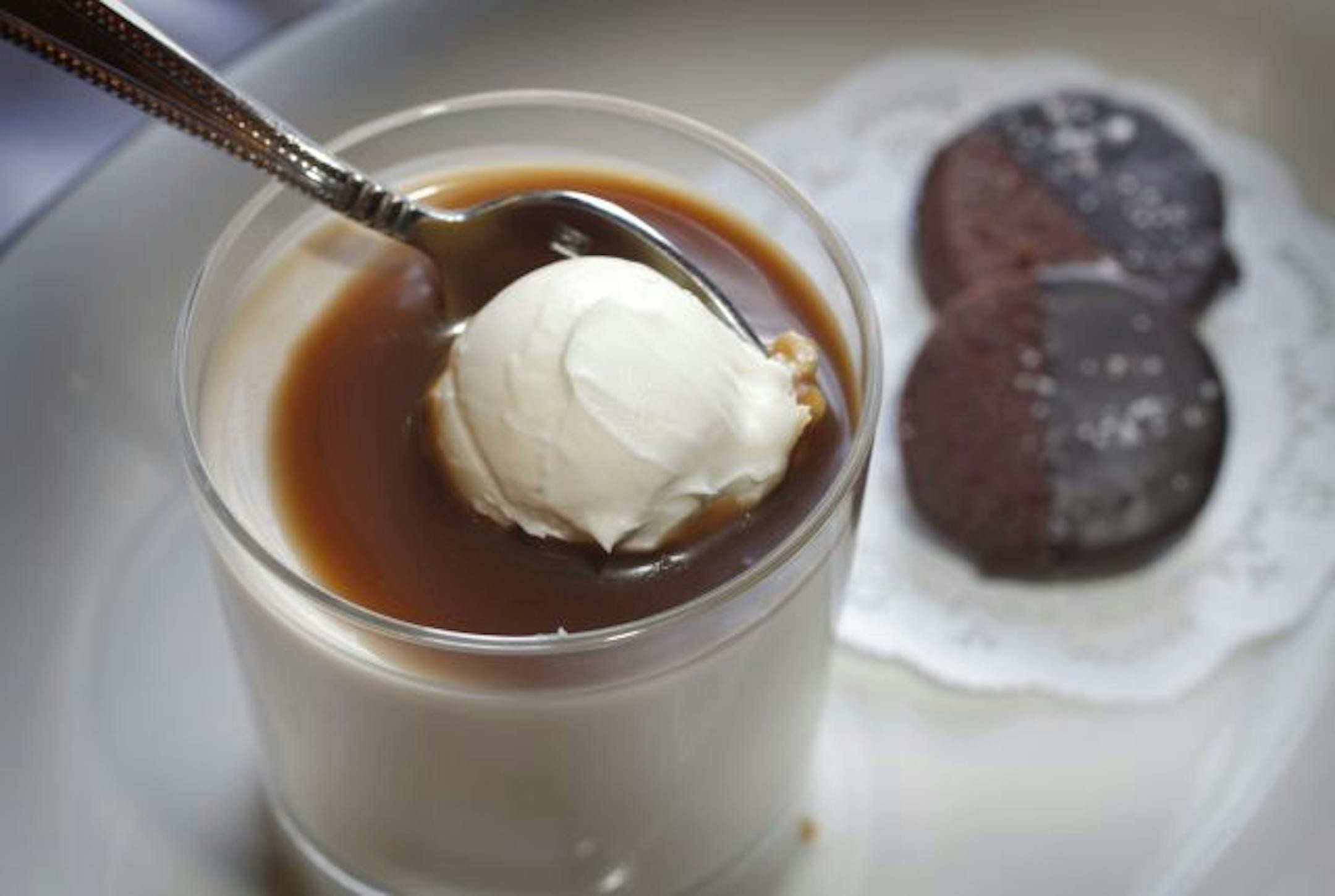 The butterscotch panna cotta served at Parma 8200 is crowned with caramel sauce and mascarpone.
