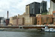 Some of the St. Paul riverfront, seen from the south side of the Mississippi River and under the new Wabasha Street Bridge. (Similar to historical vie