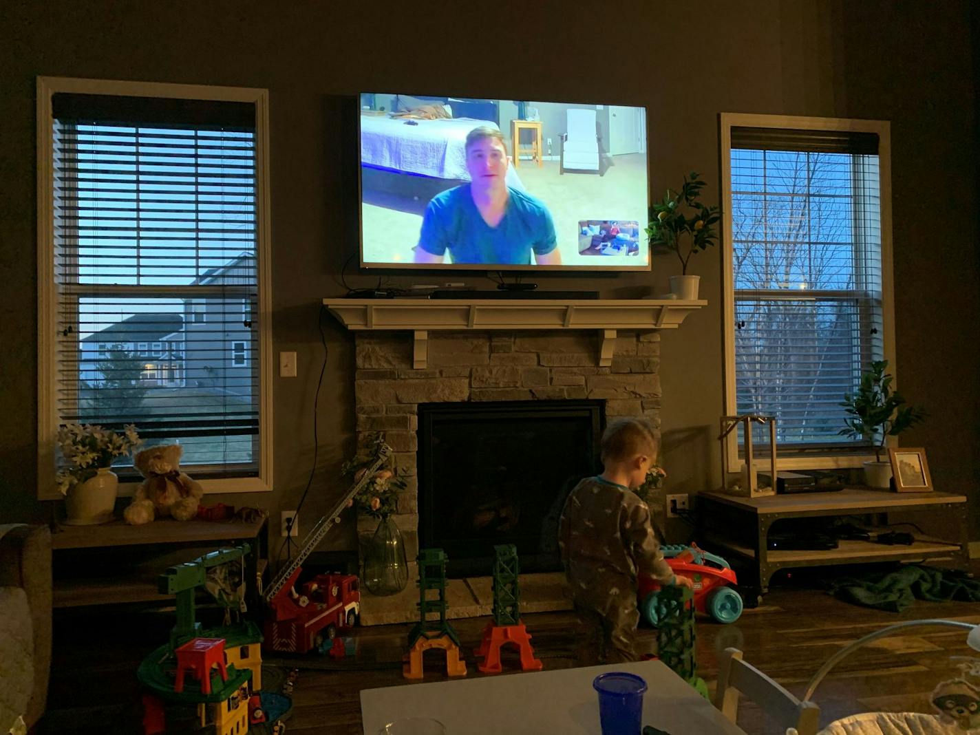 While he cared for coronavirus patients in the M Health Fairview system, and for the two-week quarantine afterward, Dr. Timothy Roach isolated himself in one room of his house, communicating with his wife and small children by video. Photo courtesy of the Roach family