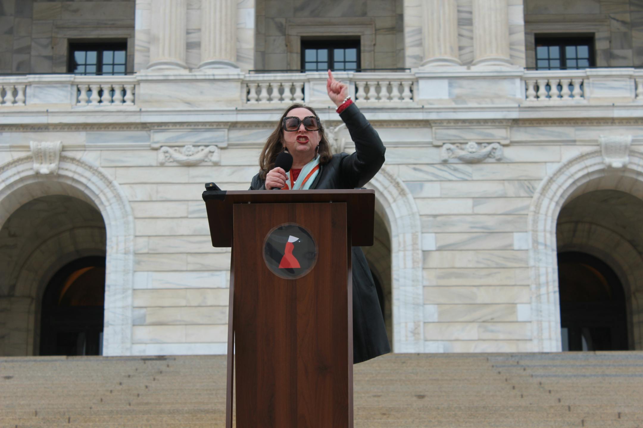 Rep. Kristin Bahner speaks at protest for the National Day of Action hosted by the Handmaids of Minnesota.