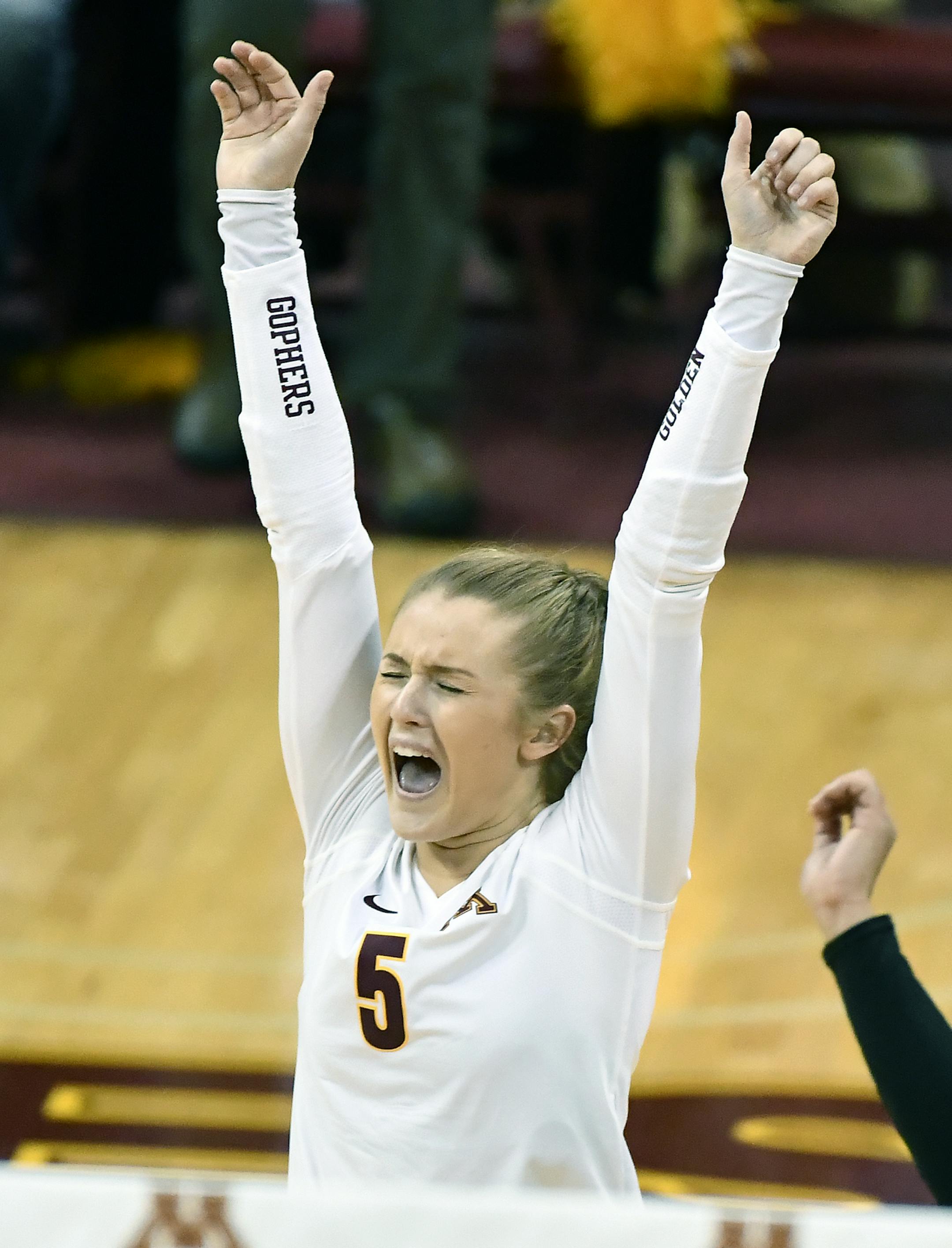 Minnesota outside hitter Alyssa Goehner (5) and libero Dalianliz Rosado (17) celebrated a point scored against Nebraska in the first set. ] (AARON LAVINSKY/STAR TRIBUNE) aaron.lavinsky@startribune.com The University of Minnesota volleyball team played Nebraska on Wednesday, Nov. 23, 2016 at the University of Minnesota Sports Pavilion.