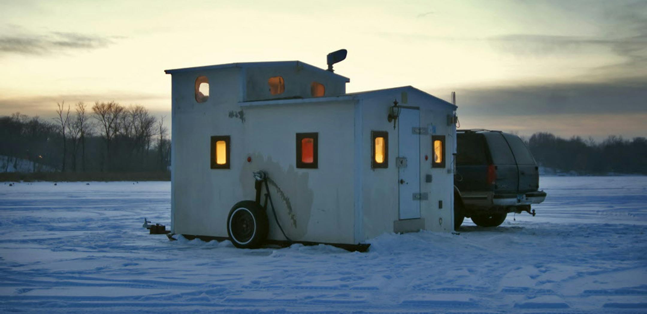 Fish houses on wheels, even homemade double-deckers like this one, are replacing the old-school fish houses built on skids and dragged to one spot on a frozen lake.