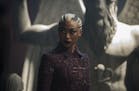 Tati Gabrielle on "Chilling Adventures of Sabrina." The Satanic Temple has sued over the statue of Baphomet in the background.