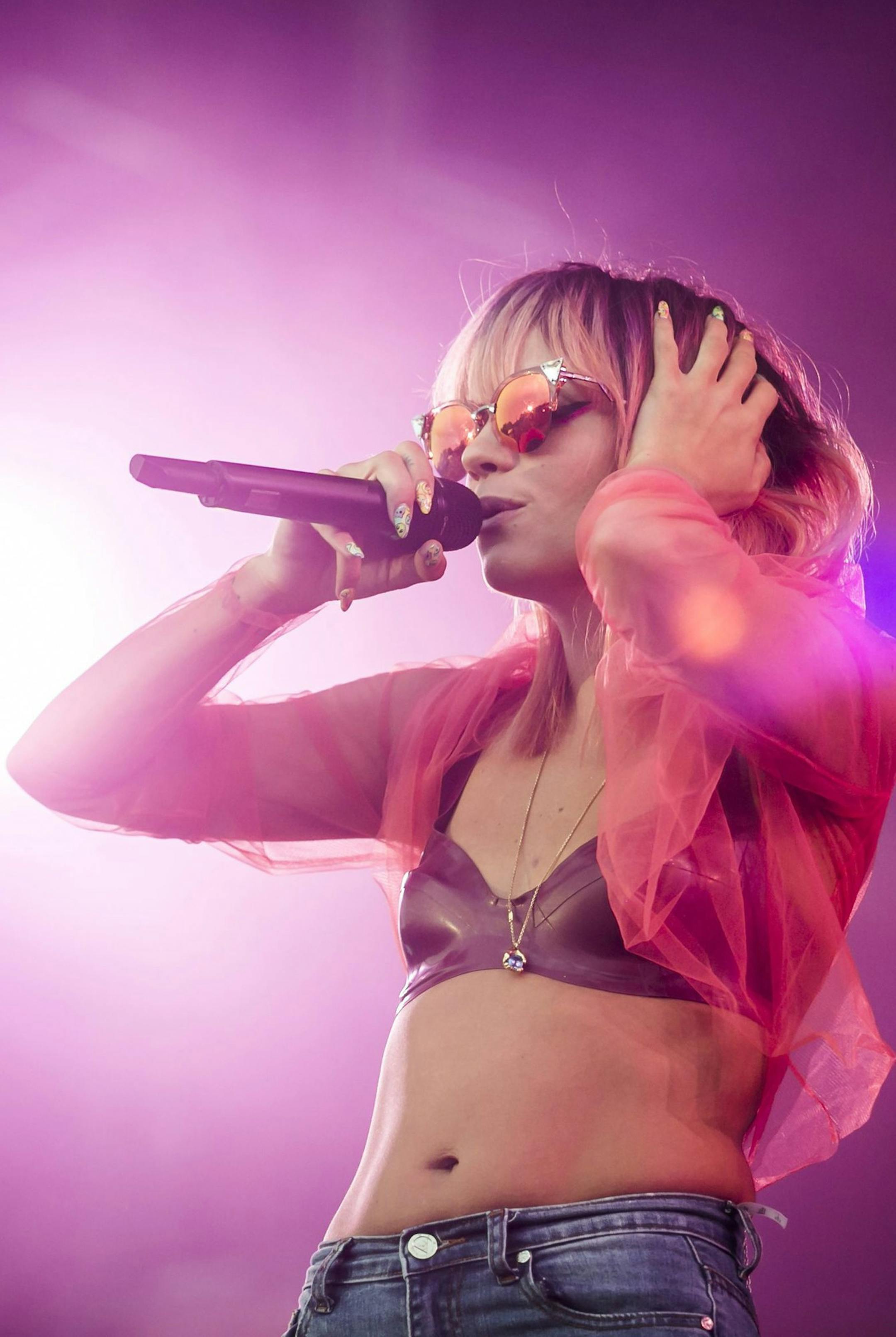 British singer, Lily Allen performs during her concert at the 22nd Sziget (Island) Festival on the Shipyard Island, in Northern Budapest, Hungary, Thursday, Aug. 14, 2014. (AP Photo/MTI, Balazs Mohai) ORG XMIT: MIN2014091909152106