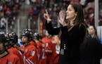 Ohio State Buckeyes head coach Nadine Muzerall directed her team during the third period Friday against the Clarkson Golden Knights. ] AARON LAVINSKY 