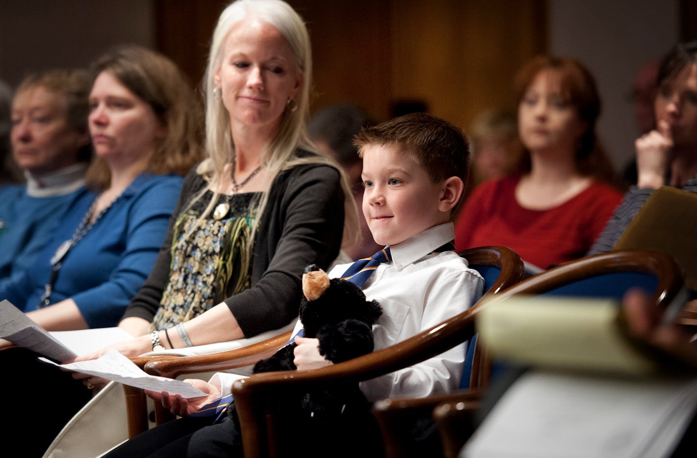 Davis Gohman, 8, brought his stuffed bear "Blackie" and his mom, Jennifer, to the State Capitol on Monday to support a bill that he and classmates at Andover Elementary School want to have passed; it would make the black bear Minnesota's state mammal. The effort began during the last school year by students in the first-grade class of teacher Dana Coleman, who was not able to attend Monday's hearing. At left, another Andover student, Alex Froslee, spoke to legislators at the hearing before the S