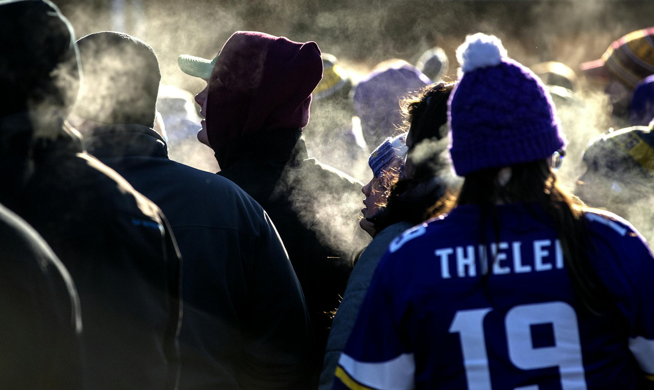 Fans stood in line in -12 temperatures to enter U.S. Bank Stadium to see the Chicago Bears take on the Minnesota Vikings in Minneapolis on Sunday, Dec. 31.