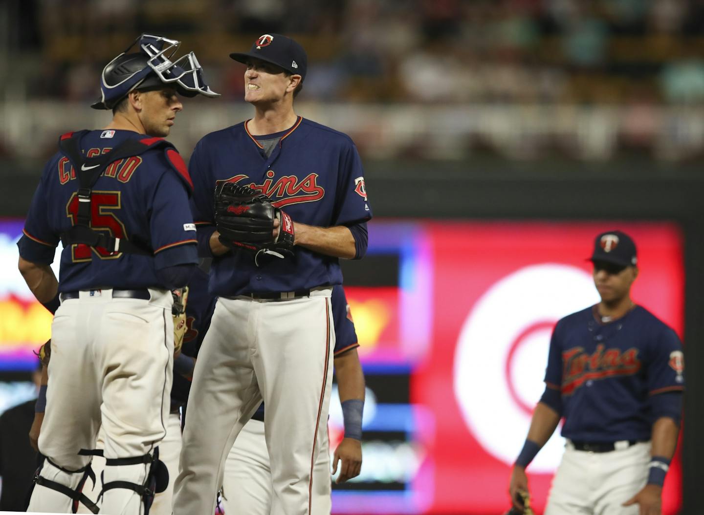 Minnesota Twins starting pitcher Kyle Gibson grimaced while waiting to be taken out of the game after walking Cleveland's Yasiel Puig to load the bases in the fifth inning.