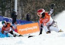 Ester Ledecka of the Czech Republic competes in the ladies parallel giant slalom snowboard event, at the Winter Olympics in Pyeongchang, South Korea, 