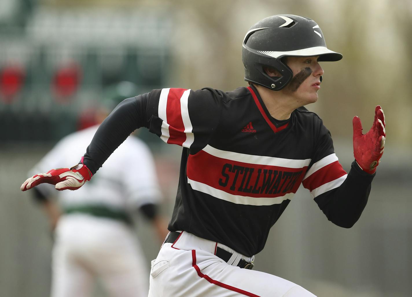 Stillwater pitcher Drew Gilbert ran for first base after hitting the ball. ] JEFF WHEELER &#x2022; jeff.wheeler@startribune.com Stillwater beat Mounds View 2-0 in a baseball game Monday afternoon, April 29, 2019 at Mounds View High School in Arden Hills.