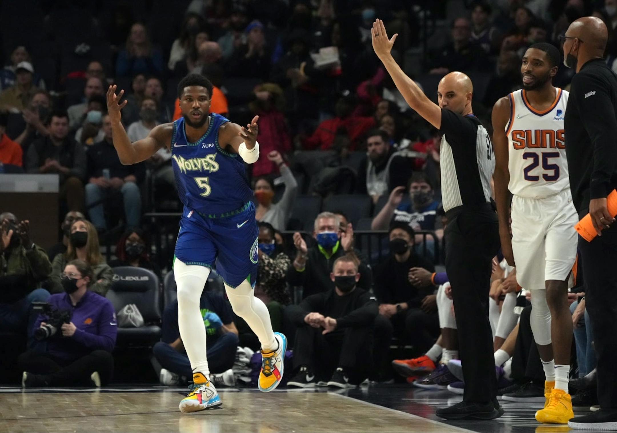 Timberwolves guard Malik Beasley (5) celebrated a three point shot to tie the game in the second quarter.