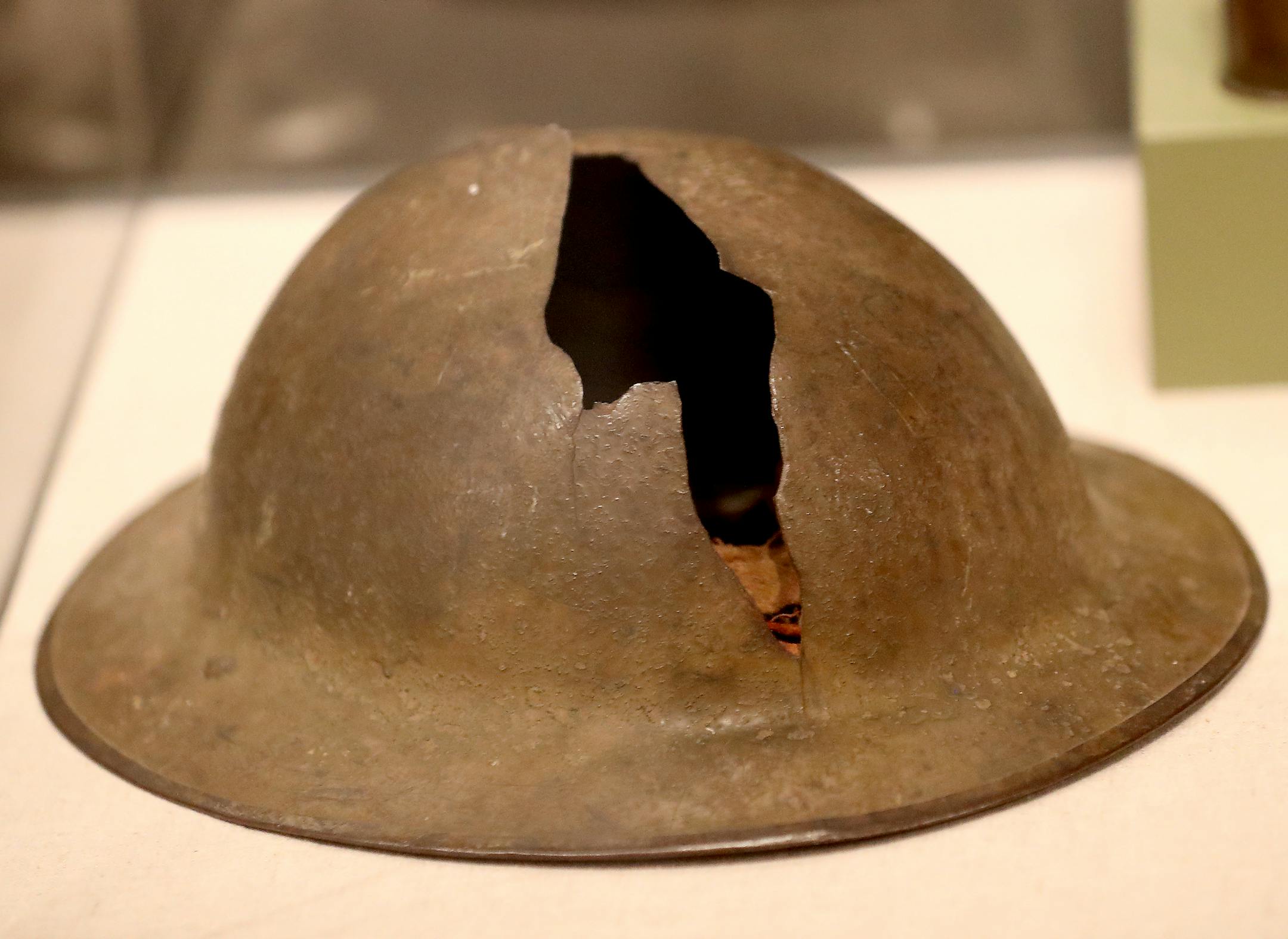 A behind-the-scenes look at the Minnesota History Center's new World War I exhibit, set to open Saturday in St. Paul and may become a traveling exhibit. Here, a WW I soldier's helmut was split by shrapnel and seen Tuesday, April 4, 2017, in St. Paul, MN.] DAVID JOLES ï david.joles@startribune.com A behind-the-scenes look at the Minnesota History Center's new World War I exhibit, set to open Saturday in St. Paul and may become a traveling exhibit. The 100th anniversary of U.S. entry into the