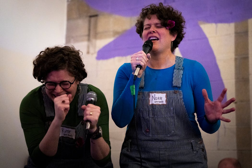 Ruth Whalen Crockett, left, cracks up as she and Nora Whalen belt out “One Moment in Time” by Whitney Houston. Crockett lives in Massachusetts and flew out to join her sister in Minneapolis to celebrate their birthday together.