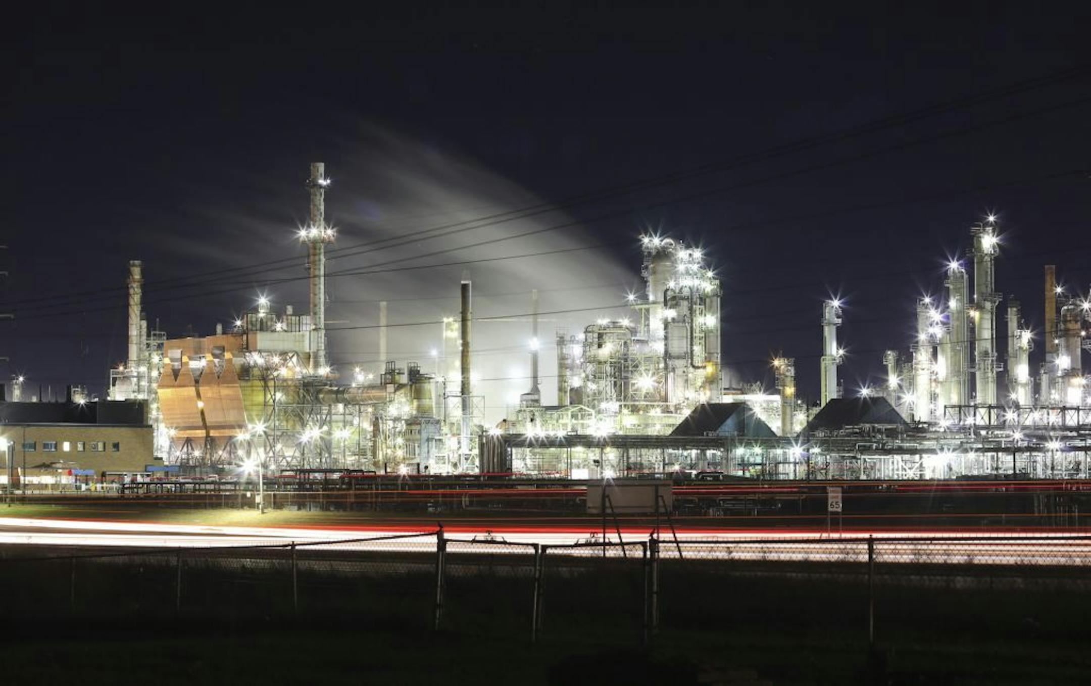Flint Hills Resources' Pine Bend Refinery in Rosemount, Minn. has a huge economic impact locally and is likely to get even bigger with a recently proposed capital improvement project that would bring an added 500 workers to the facility. The Pine Bend Refinery in a view from the Pine Bend Cemetery across Highway 55 Monday evening, December 4, 2012.
