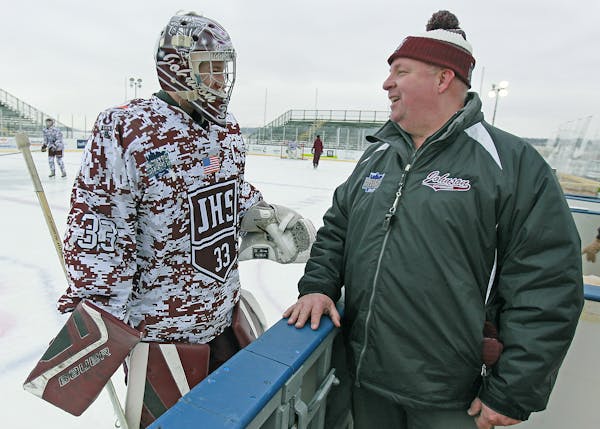 St. Paul Johnson Goalie Sam Moberg and his coach Moose Younghans practiced at Holman Field Rink, Friday, January 16, 2015 in St. Paul, MN. Moberg has 