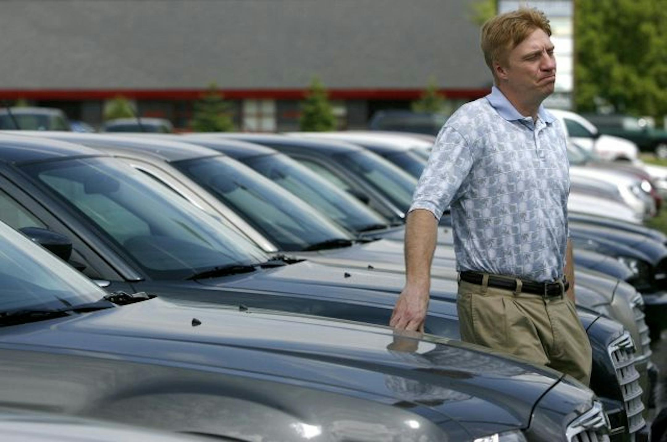 Co-owner Jim Leonard at his dealership last year after theclosings announcement. Lake Elmo Chrysler filed for arbitration and recently won its case to be reinstated.