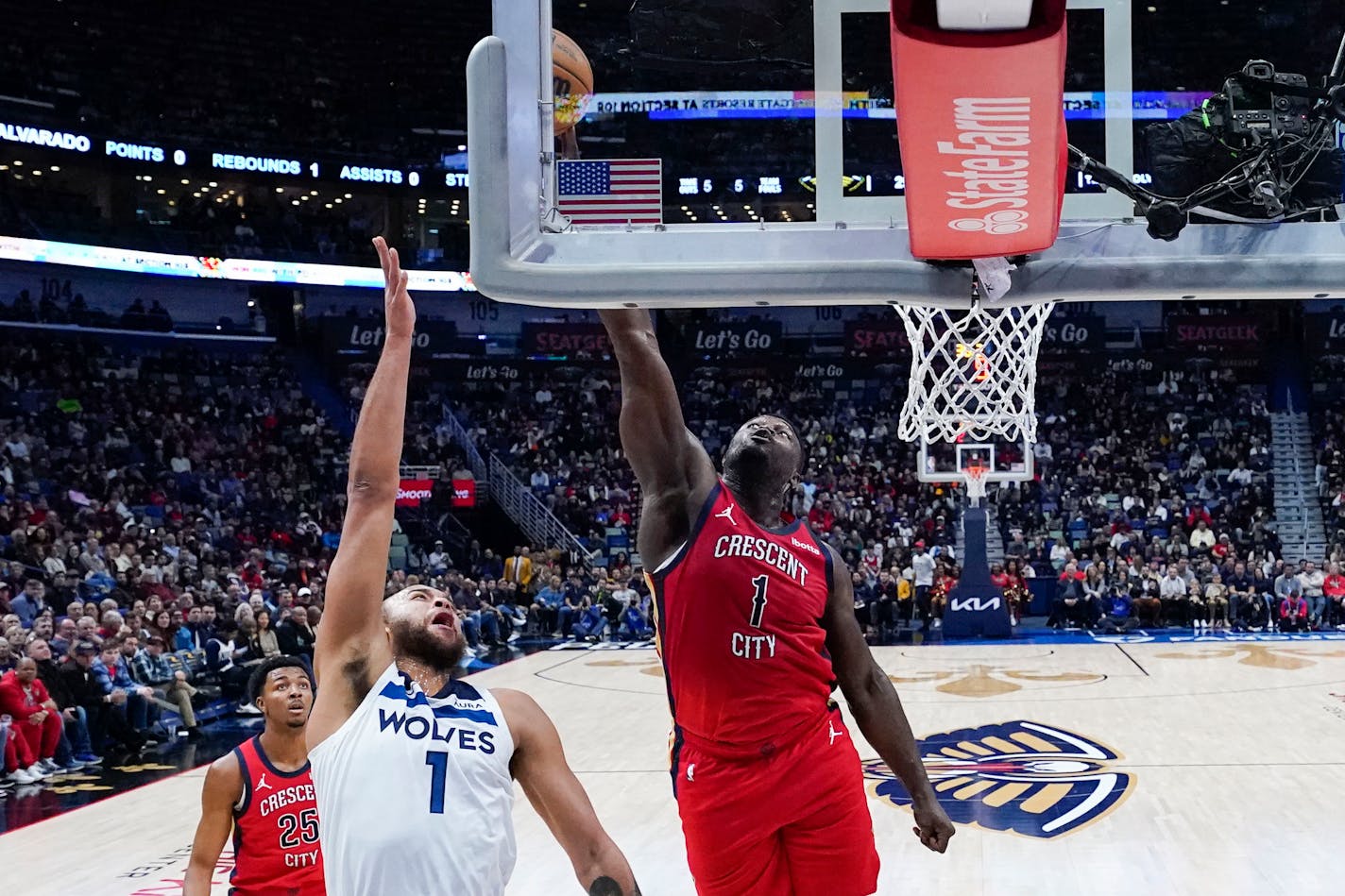 New Orleans Pelicans forward Zion Williamson (1) blocks a shot by Minnesota Timberwolves forward Kyle Anderson (1) in the first half of an NBA basketball game in New Orleans, Monday, Dec. 11, 2023. (AP Photo/Gerald Herbert)