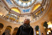 Sandra Johnson explores the State Capitol rotunda before heading to a meeting to listen to Sen. Scott Dibble, DFL-Minneapolis, on Wednesday. Minnesota