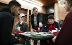 Paul Gutterman, who is a tax professor at the University of Minnesota and an avid bridge player, gave a group of honors students guidance on their fin