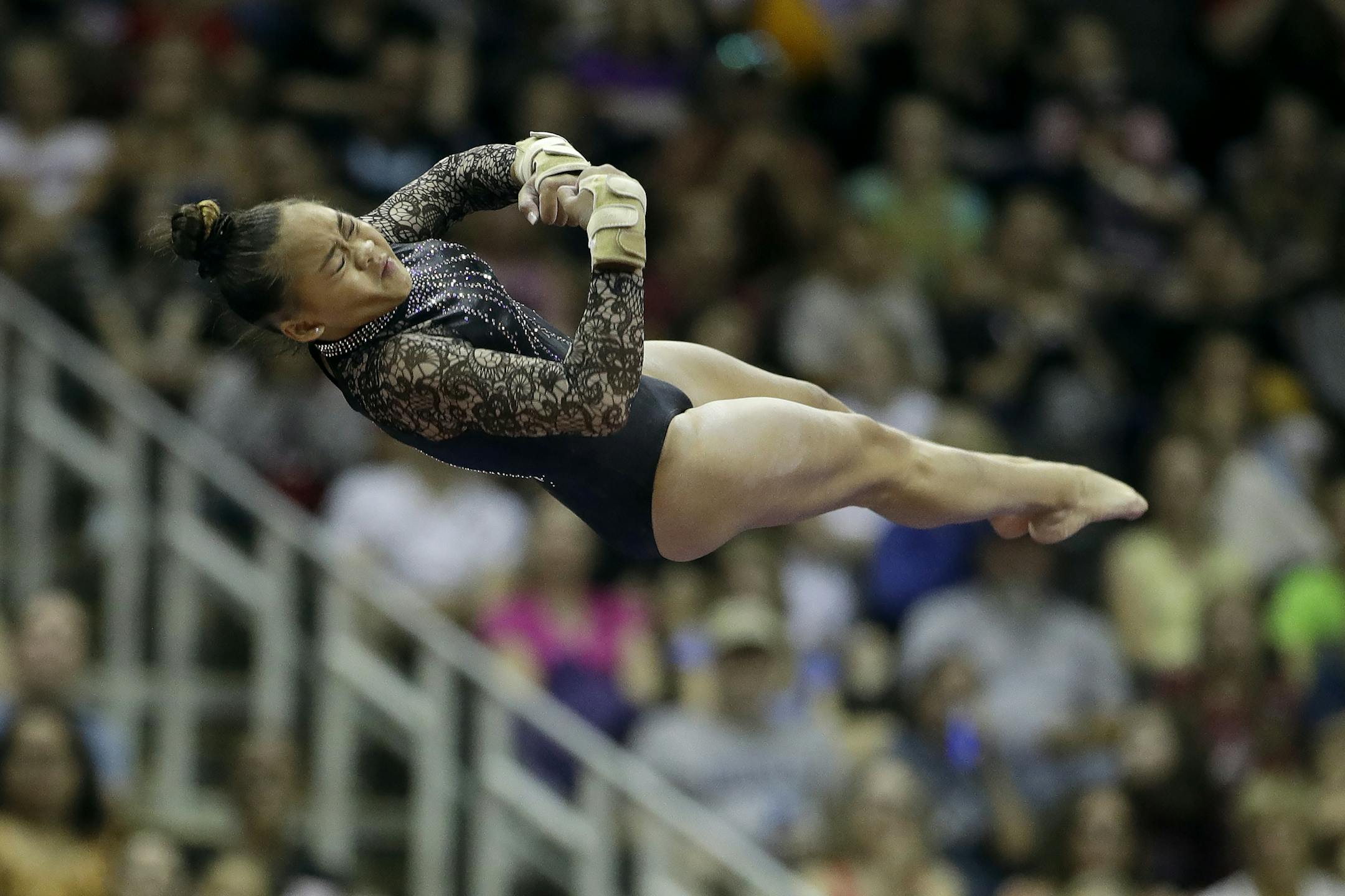 Sunisa Lee competes in the vault during the senior women's competition at the 2019 U.S. Gymnastics Championships Sunday, Aug. 11, 2019, in Kansas City, Mo. Lee finished second in the all-around. (AP Photo/Charlie Riedel)