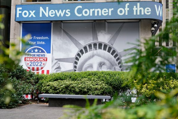 The Fox News ticker on the News Corp. building in New York on July 26. Dominion Voting Systems alleges that Fox repeatedly aired false, far-fetched an
