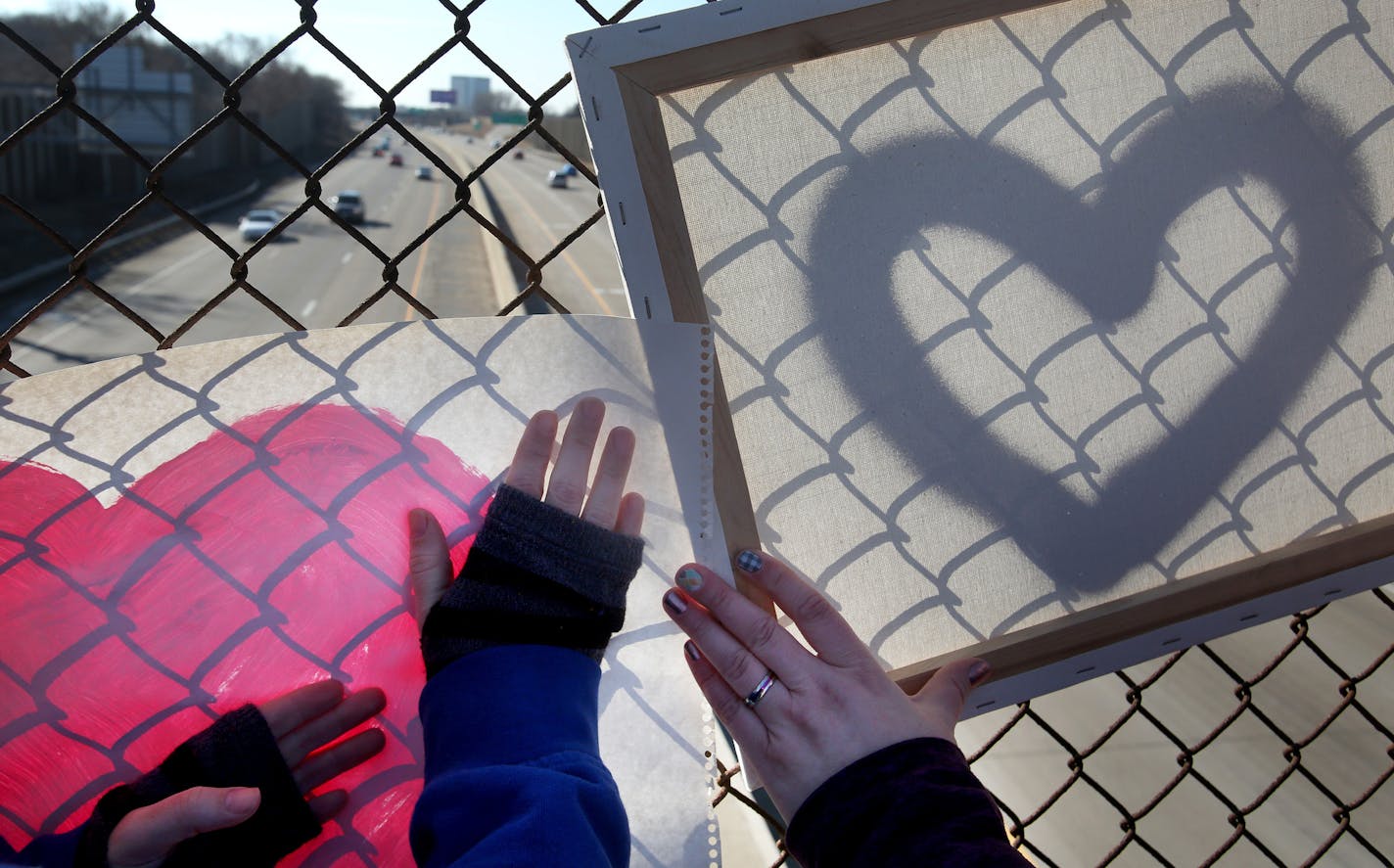 The Richfield Social Justice Community, an online group, stood on an overpass bridge over the 35W in Richfield, holding heart signs advocating for inclusivity and equality in the city Saturday, March 4, 2017, in Minneapolis, MN.] DAVID JOLES &#xef; david.joles@startribune.com In reaction to our undoubtedly divided political times, many suburban residents (Richfield, Edina, Bloomington, etc.) are moving beyond social networks and looking to make a bigger impact with their voice. Social justice gr