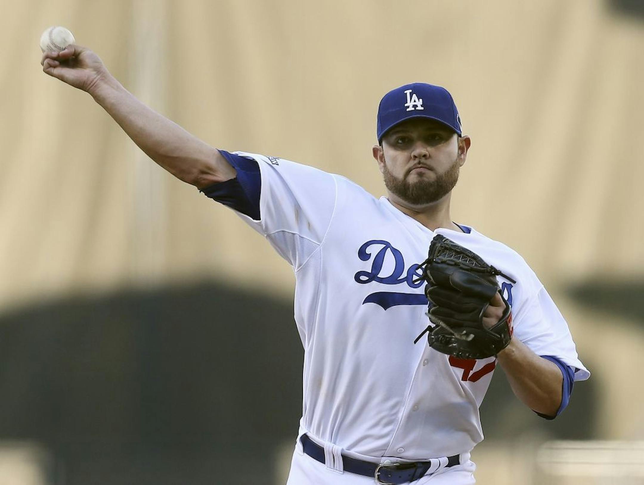 Los Angeles Dodgers starting pitcher Ricky Nolasco throws during the first inning of Game 4 of the National League baseball championship series against the St. Louis Cardinals, Tuesday, Oct. 15, 2013, in Los Angeles.