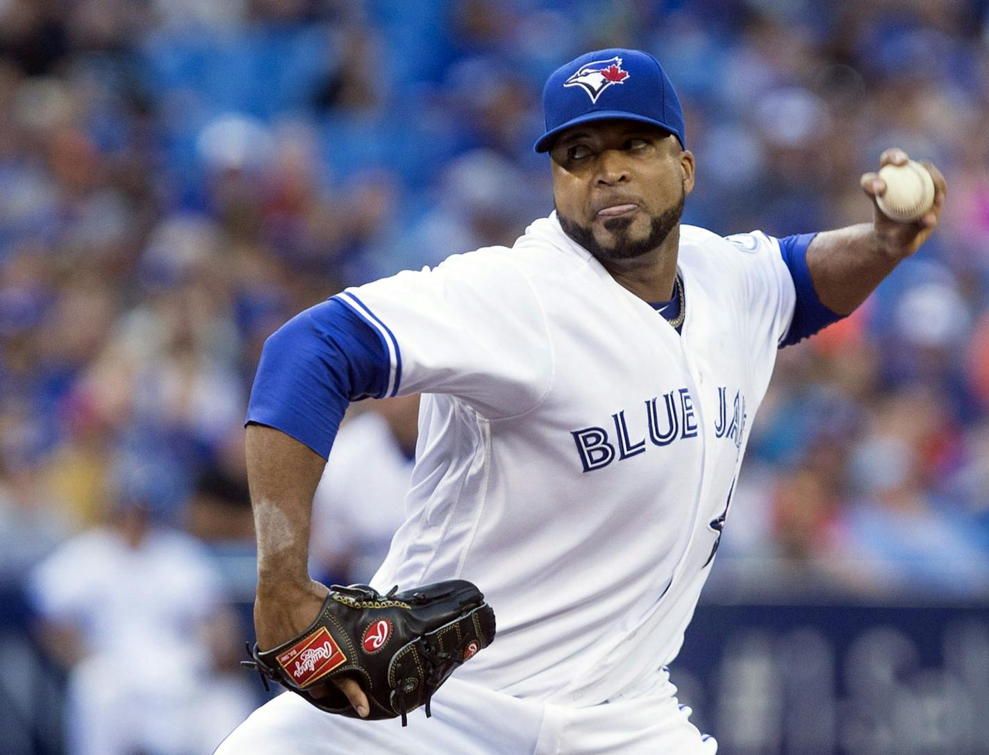 Toronto Blue Jays starting pitcher Francisco Liriano works against the Minnesota Twins during first-inning baseball game action in Toronto, Friday, Aug. 26, 2016. (Chris Young/The Canadian Press via AP)