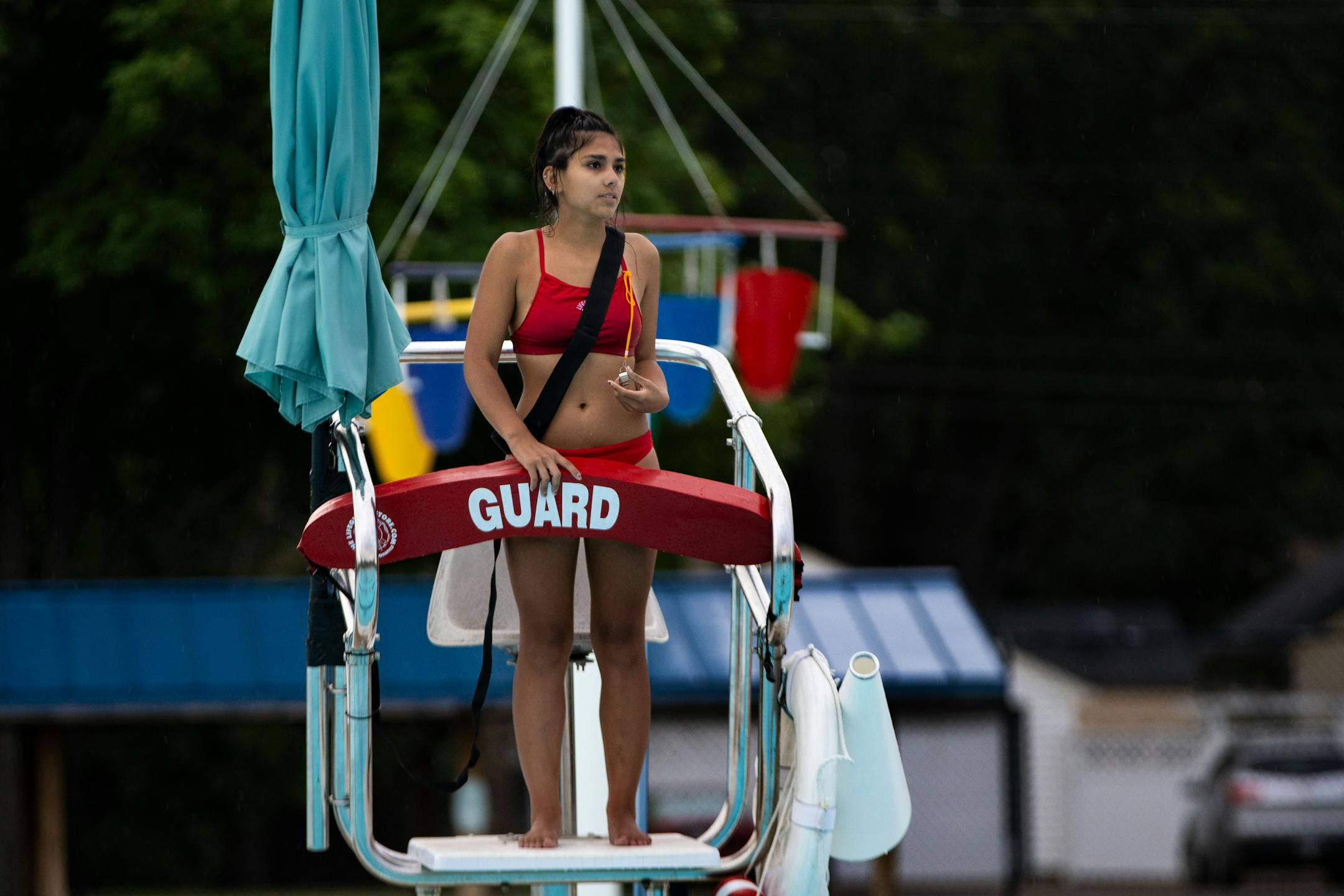 A lifeguard student watches for rule-breaking.