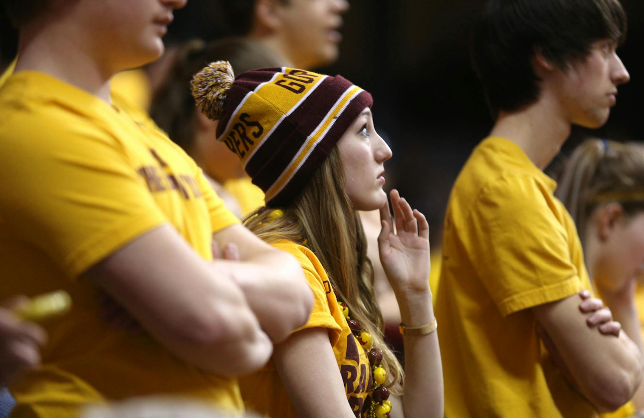 Gopher fan Annamarie Rutledge looked up at the clock in the first half against High Point. ] (KYNDELL HARKNESS/STAR TRIBUNE) kyndell.harkness@startribune.com First round of the National Invitational Tournament at Williams Arena in Minneapolis Min, Tuesday March 18, 2014.