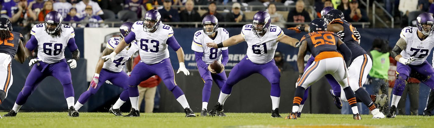 Minnesota Vikings offensive lineman T.J. Clemmings (68), Brandon Fusco (63), Joe Berger (61), and Jake Long (72) protected quarterback Sam Bradford. ] CARLOS GONZALEZ cgonzalez@startribune.com - October 31, 2016, Chicago, IL, Soldier Field, NFL, Minnesota Vikings vs. Chicago Bears ORG XMIT: MIN1611011114320051