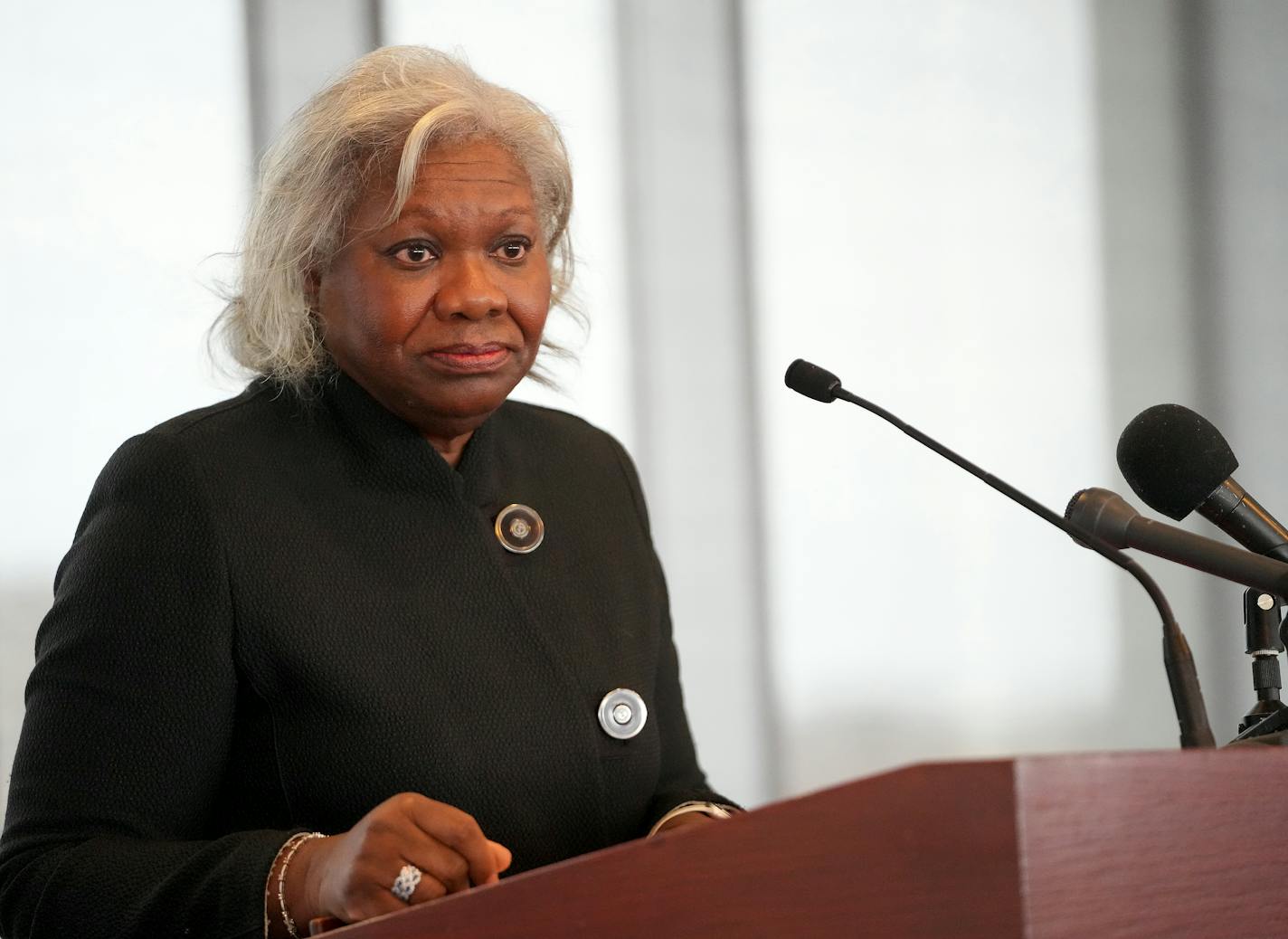 Hamline University President Fayneese Miller at podium.