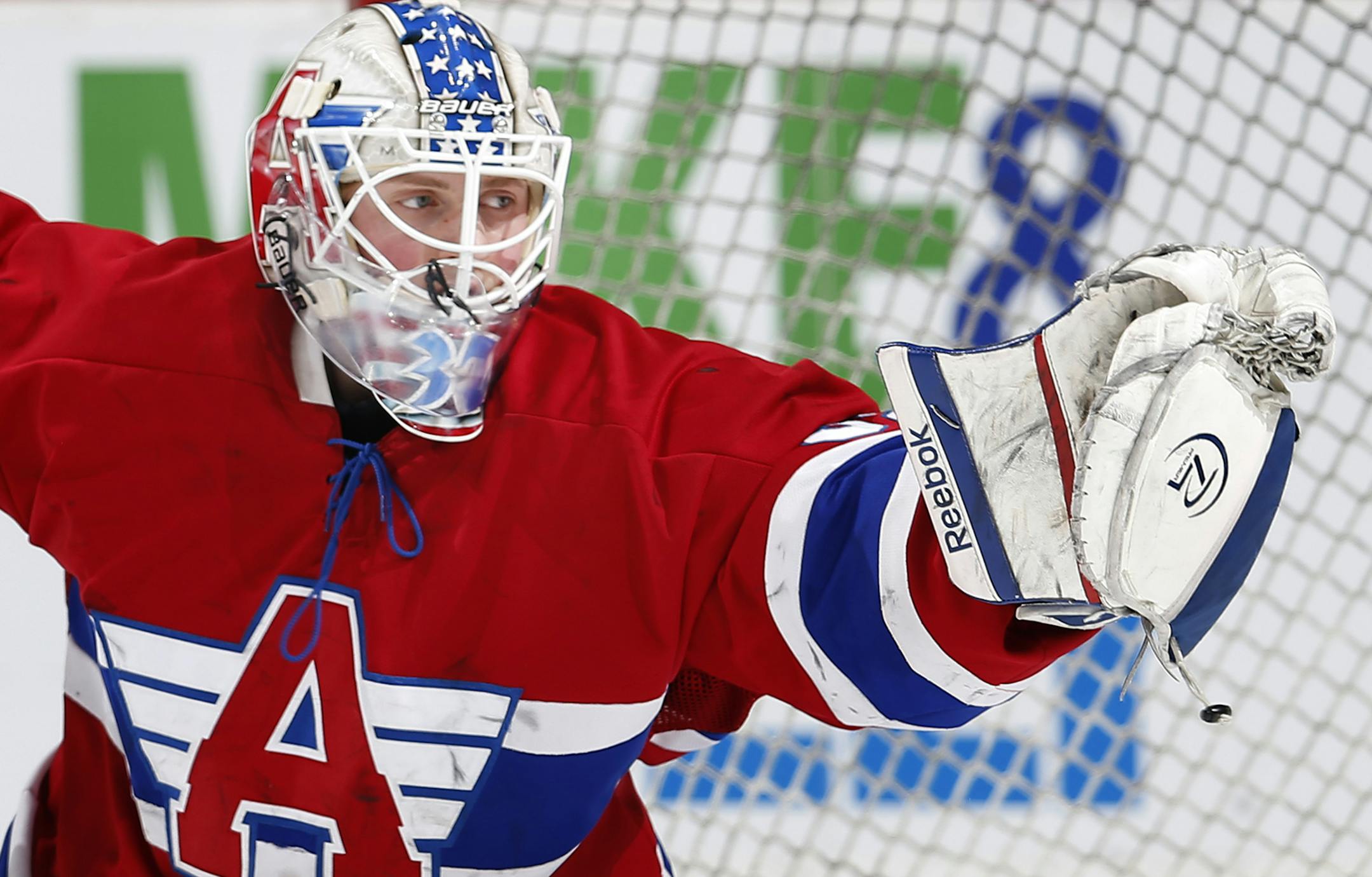 St. Cloud Apollo goalie Nick Althaus (32) made a save in the first period. ] CARLOS GONZALEZ cgonzalez@startribune.com, March 4, 2015, St. Paul, MN, Xcel Energy Center, Minnesota boys hockey state tournament quarterfinals, Class 1A, St. Cloud Apollo vs. Breck