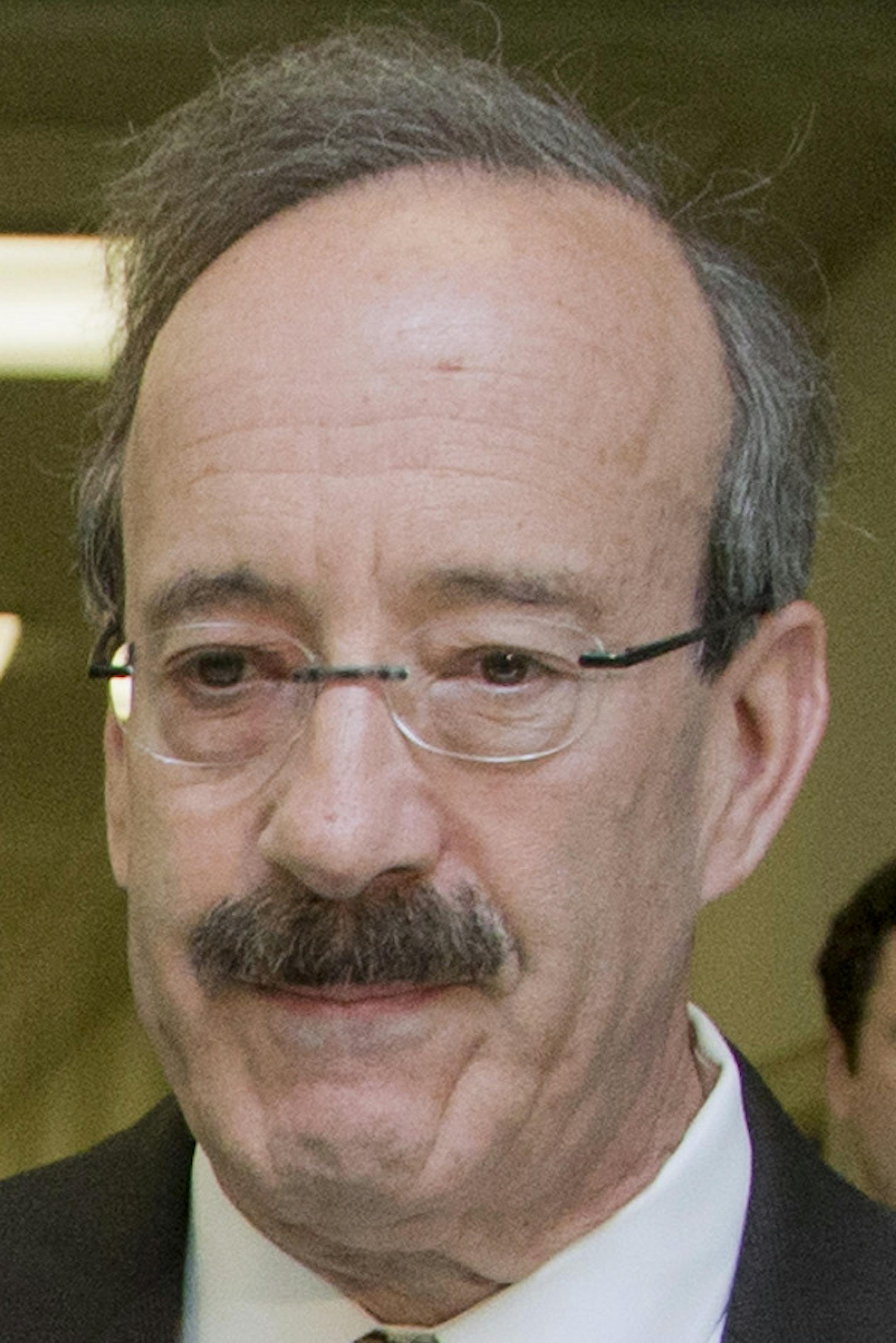 Deborah Peter, center, walks with House Foreign Affairs Committee Chairman Rep. Ed Royce, R-Calif., left, and, the committee's ranking member Rep. Eliot Engel, D-N.Y. to a hearing room on Capitol Hill in Washington, Wednesday, May 21, 2014, following a news conference. Peter, is a sole survivor of a Dec. 11, 2011, Boko Haram attack on her household in Nigeria, where her father and brother were killed for not renouncing their Christian faith. (AP Photo/Manuel Balce Ceneta)