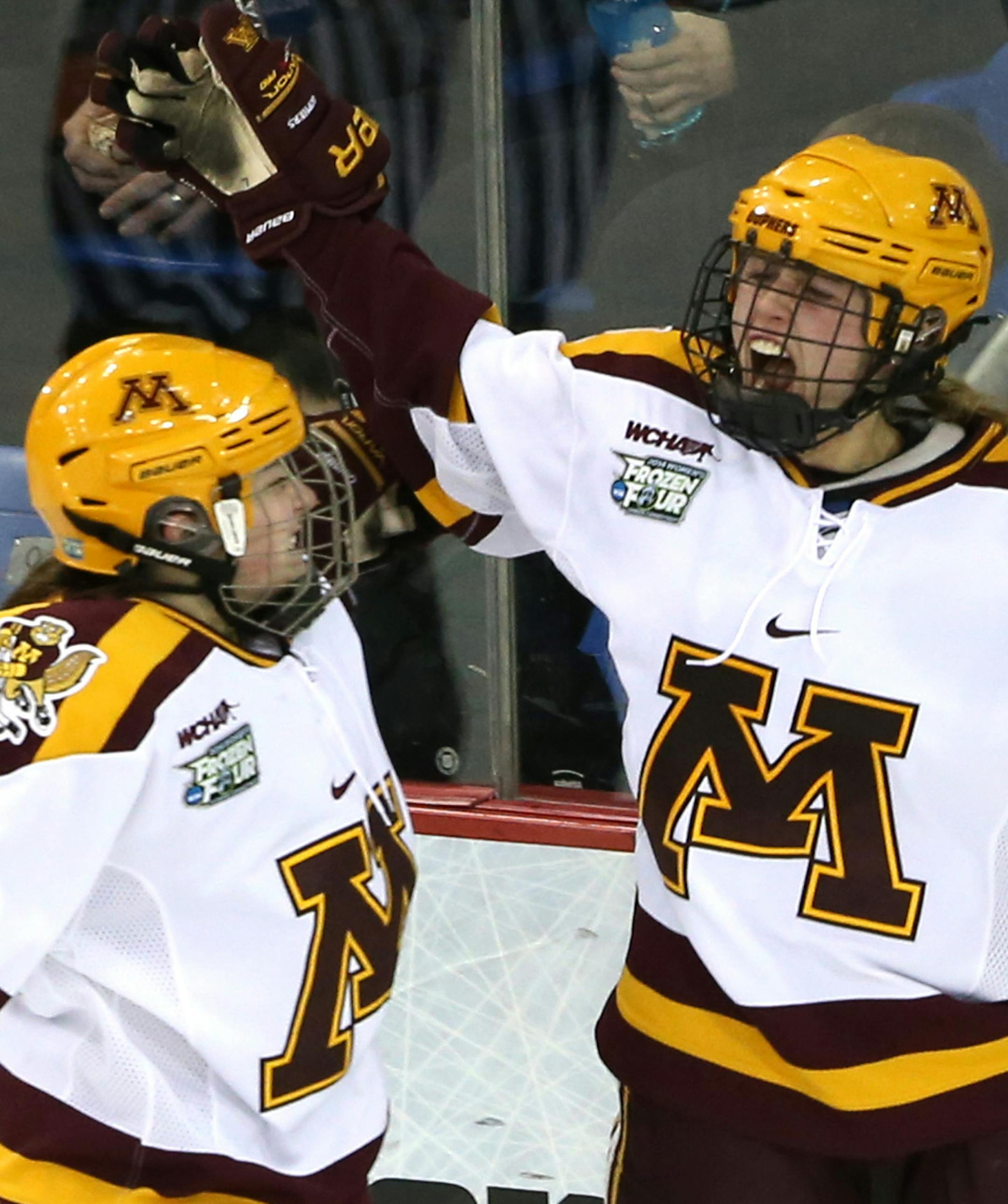 Gopher's Rachael Bona celebrated with Kate Schipper after Bona scored a goal on Wisconsin's Alex Rigsby during third period. ] (KYNDELL HARKNESS/STAR TRIBUNE) kyndell.harkness@startribune.com Minnesota vs Wisconsin during the semifinals round of the NCAA Women's Frozen Four in Hamden, Conn Friday, March 21, 2014. Gophers won over the Badgers 5-3.