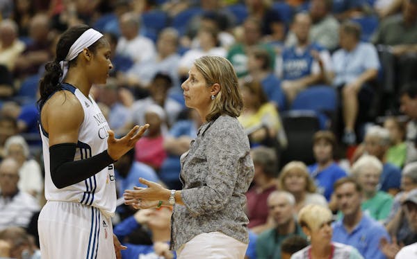 Minnesota Lynx forward Maya Moore (23) talks with head coach Cheryl Reeve during the second half of a WNBA basketball game against the Connecticut Sun