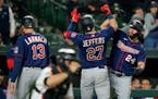 The Twins' Ryan Jeffers is greeted near home plate by Gary Sanchez after Jeffers scored Sanchez, Trevor Larnach and himself on three-run home run agai