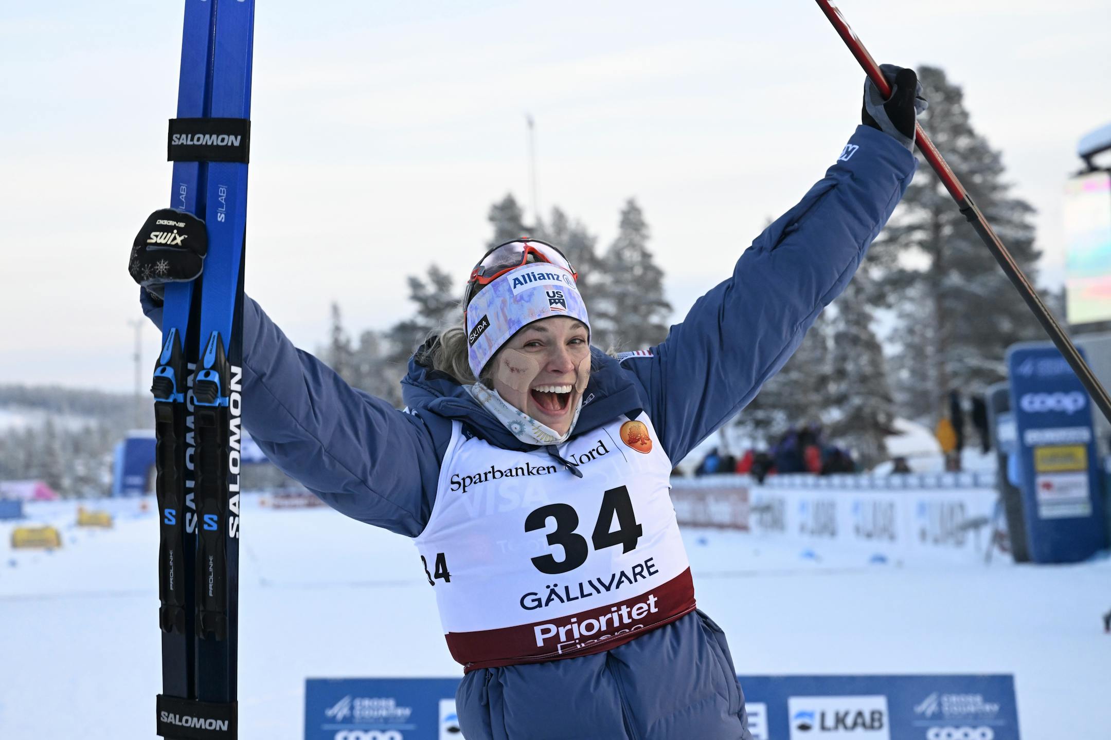 Jessie Diggins of The United States celebrates winning the cross-country ski, women's World Cup 10km event, in Gallivare, Sweden, Saturday, Dec. 2, 2023. (Ulf Palm/TT News Agency via AP)